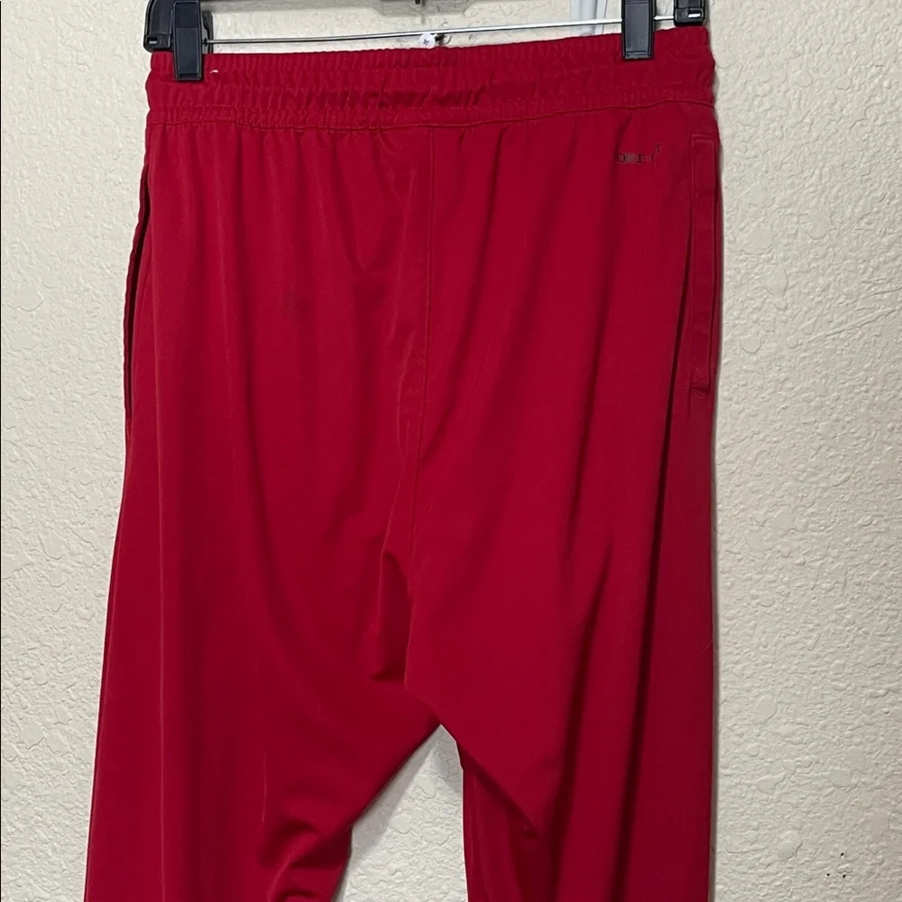 Jordan Red Warm Up Pants With Zipper At Hems. Good Condition. Size M.